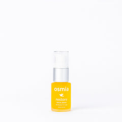 Osmia Natural Restore Serum carrot-seed oil dropper highlights nourishing texture enhancement.