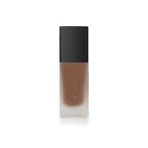 Osmosis Flawless Foundation bottle close-up highlights lightweight formula for natural coverage