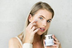 Osmotics Blue Copper 5 Prime Face cream swirl on hand, highlighting velvety texture and fast absorption