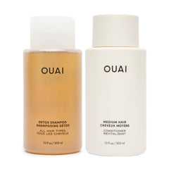 OUAI Detox Shampoo bottle close-up highlighting clarifying power for buildup.