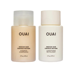 OUAI Medium Shampoo bottle pouring for hydrated, frizz-controlled hair