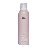 OUAI Super Dry Shampoo bottle ready to refresh roots.