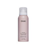 OUAI Super Travel Dry Shampoo bottle showing compact 2 oz packaging and travel-friendly design.
