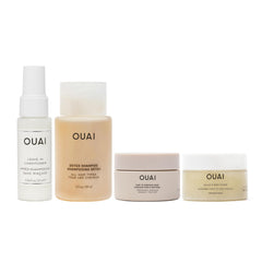 OUAI Travel Kit Leave-In Conditioner bottle detangles and protects hair during styling.