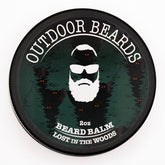 Outdoor Beards Beard Balm bottle close-up shows creamy texture for nourished beard and skin.