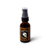 Outlaws & Gents Grooming Co grooming oil bottle pour: natural, non-greasy beard conditioning.