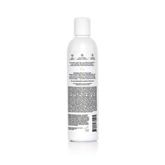 Close-up of the conditioner label highlights blue toning to reduce brassiness