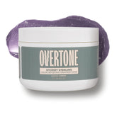 Overtone Stormy Sterling bottle pour shows the color depositing mask in action.