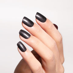 Ozzeal black glitter gel swatch on nails shows bold finish and lasting shine.