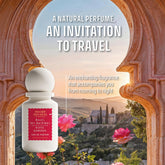 Damask rose and peony notes close-up implying refined, luxurious character.