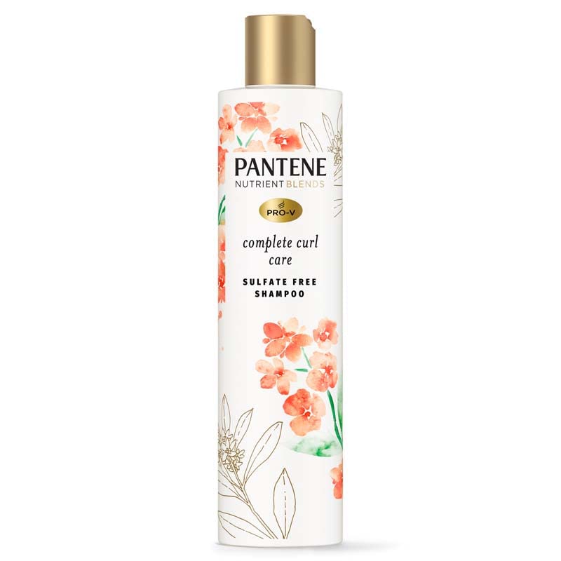 Pantene Complete Curl Care Shampoo bottle pouring, delivering hydrating cleansing for curly hair.