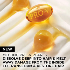 Pantene hands applying mask to hair mid-length for even conditioning.