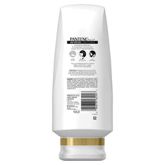 Pantene Pro-V Curl Perfection Conditioner label closeup emphasizing frizz control