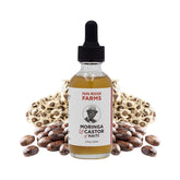 Papa Rozier Farms castor moringa oil bottle pour provides rich moisture for healthy hair.