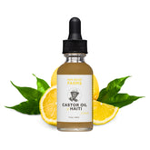 Papa Rozier Farms Lemon Castor Oil bottle showing premium organic product for scalp nourishment and shine.