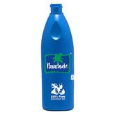 Parachute coconut oil bottle pour shows pure, unrefined oil ideal for skin care