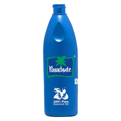 Parachute coconut oil bottle pour shows pure, unrefined oil ideal for skin care