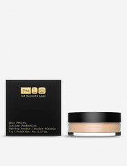 Pat McGrath Labs Sublime Perfection Setting Powder jar close-up for silky, natural finish.