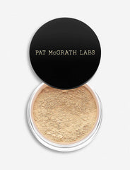 Pat McGrath Labs Sublime Perfection Setting Powder on travel palette for daytime touch-ups.