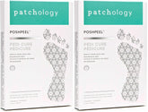 Patchology PoshPeel Pedi Cure booties on feet for exfoliation and smoother skin