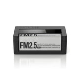 PATRICKS FM2.5 bottle pouring, highlighting a matte finish for versatile styling throughout the day.