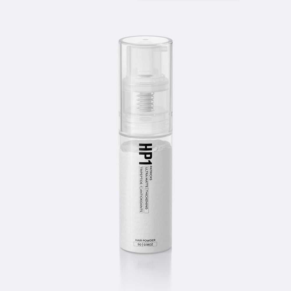 Patricks HP1 thickening powder applied to roots for fuller hair and natural texture.