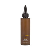 PATTERN Beauty scalp serum with rosemary and peppermint bottle soothes a dry scalp.