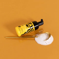 PATTERN mousse in hands applying for wash-and-go definition.