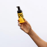 PATTERN Beauty mini curl mousse bottle showcases lightweight definition for bouncy curls.