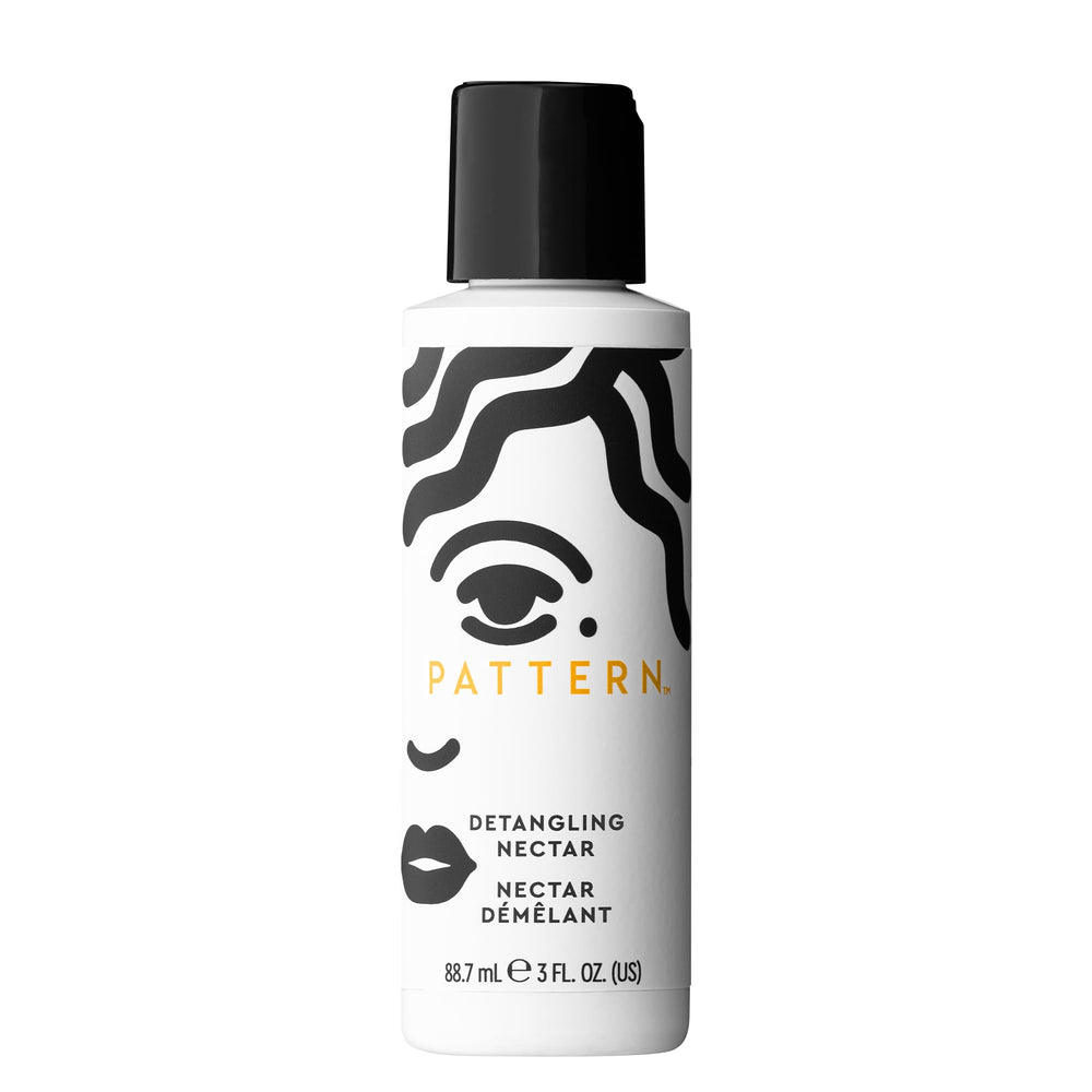 PATTERN Detangling Nectar bottle pour shows smooth slip for easy detangling.