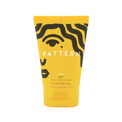 PATTERN Beauty mini curl gel travel size bottle close-up shows smooth texture and defined curls.