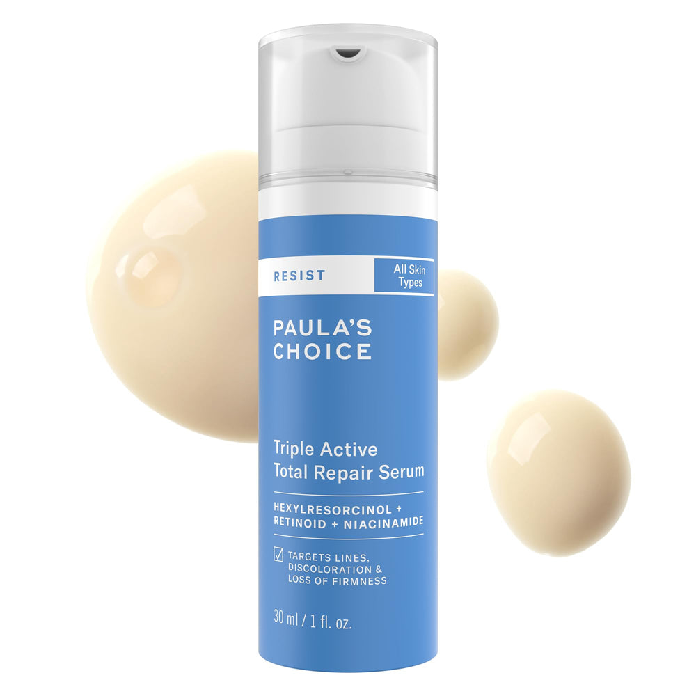 Paula's Choice RESIST Triple Active Total Repair Serum bottle closeup, fragrance-free for sensitive skin.