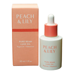 Peach & Lily Pure Beam Luxe Oil bottle close-up for radiant, balanced skin