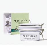 Peep Club Soothing Coconut Eye Balm packaging closeup for travel-friendly hydration.