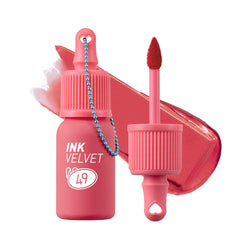 Peripera Ink The Velvet Lip Tint 049 Last Red bottle delivers bold color with smooth finish.