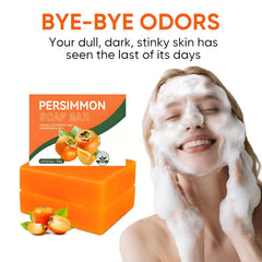 Close-up of persimmon soap bar forming light lather for cleansing