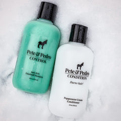 Peppermint oil droplets signal cooling relief and a cool scalp during use.