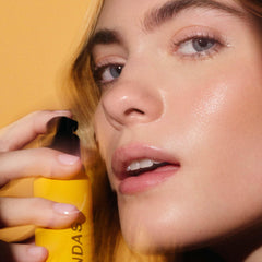 Peter Dundas tinted moisturizer universal-tone adjustment beads blend with skin.