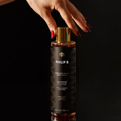 PHILIP B Forever Shine rinse showing moisture-locking Safflower Oleosomes.