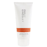 Philip Kingsley Re-Moisturizing Conditioner bottle pour promotes lightweight hydration.