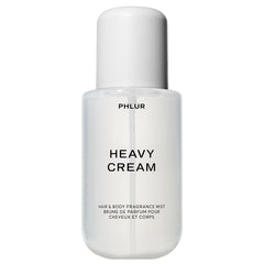 PHLUR Heavy Cream bottle showcases a luxurious, wearable scent for daily layering.