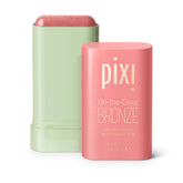 Pixi On-the-Glow Bronze WarmGlow stick applied to cheek for natural glow