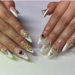Pizadix gold bow charm adds chic detailing to nails