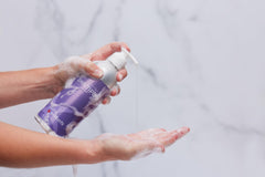 Plaine Products Citrus Lavender conditioner bottle, hydrating formula for shine.
