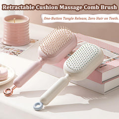 PMDYBY white retractable cushion massage comb for portable grooming and styling.