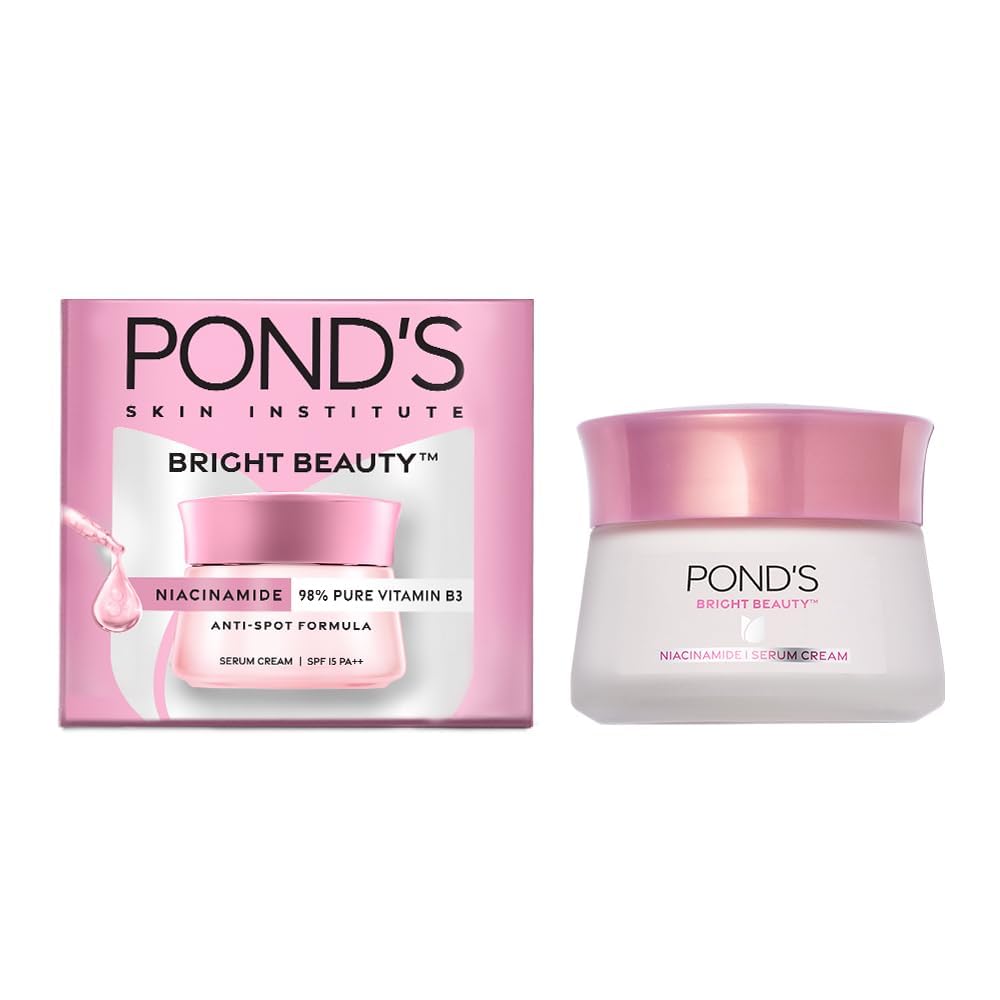 POND'S Bright Beauty SPF 15 cream tube close-up with lightweight brightening formula.