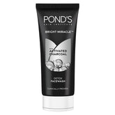 Pond's Pure White Facial Foam bottle pour shows activated carbon cleansing effect.