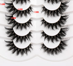 Pooplunch crossed wispy lashes add flutter and volume for special occasions.