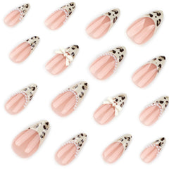 Posyofet leopard-print press-on nails with a 3D bow for bold style.