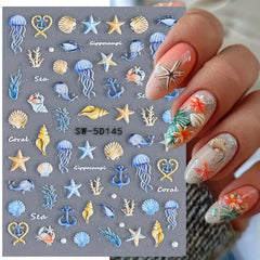 POWPOP 5D embossed ocean life nail stickers with seashells for a realistic summer manicure.